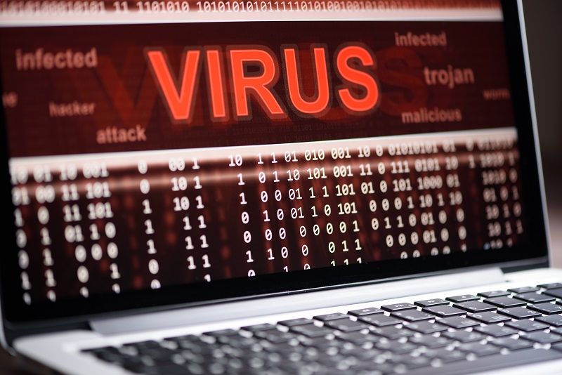 Ein Computerbildschirm zeigt eine Virenwarnung an, was mit dem TIFF-Bildformat nicht passieren kann.