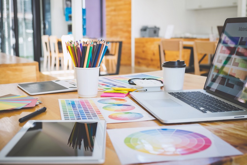 A table filled with design tools.